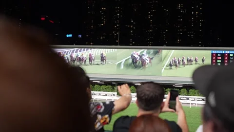 Excited Crowd Capturing Running Horse at Horse Racing - 4K Stock Footage 247097364