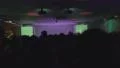 Excited crowd partying at club, light effects on background HD Footage