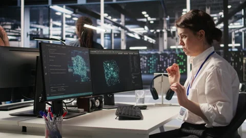 Excited data center engineer dancing after achieving AI breakthrough Stock Footage 309781339