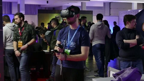 Excited Developer Wearing Vr Goggles Playing Virtual Reality Shooter Game Stock-Footage 84958056