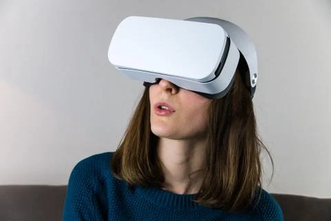 Excited girl uses vr box Stock Photos