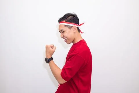 Excited Guy Screams with Joy While Celebrating Indonesian Independence, Dre.. Stock Photos