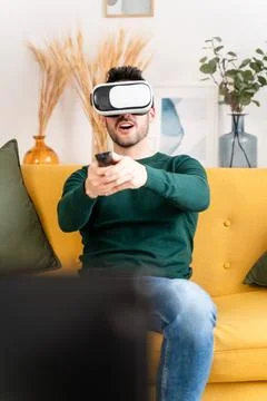 Excited man exploring virtual reality Stock Photos