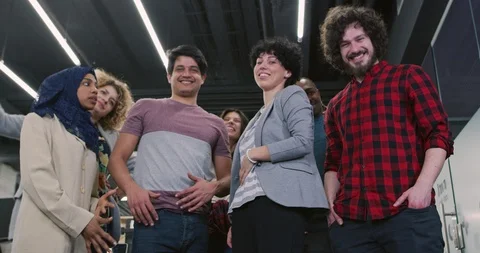 Excited multiethnic business team of software developers standing and looking Stock Footage 114080133