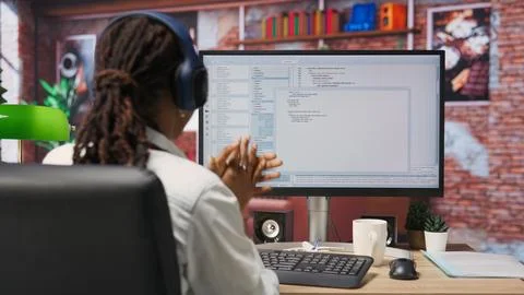 Excited programmer testing code on PC, clapping hands after positive result Stock Photos