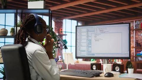 Excited programmer testing code on PC, clapping hands after positive result Stock Photos
