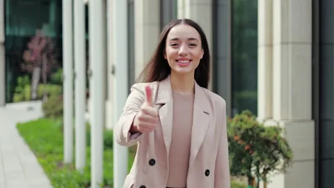 Excited trainee making like sign and smiling to camera with proud look Stock-Footage 274692748