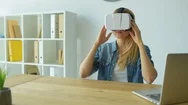 Excited Woman Trying On Visual Reality Headset Stock Footage