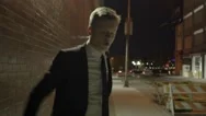 Excited Young Businessman Dancing In The City Street At Night. Shot On Red Epic Stock Footage