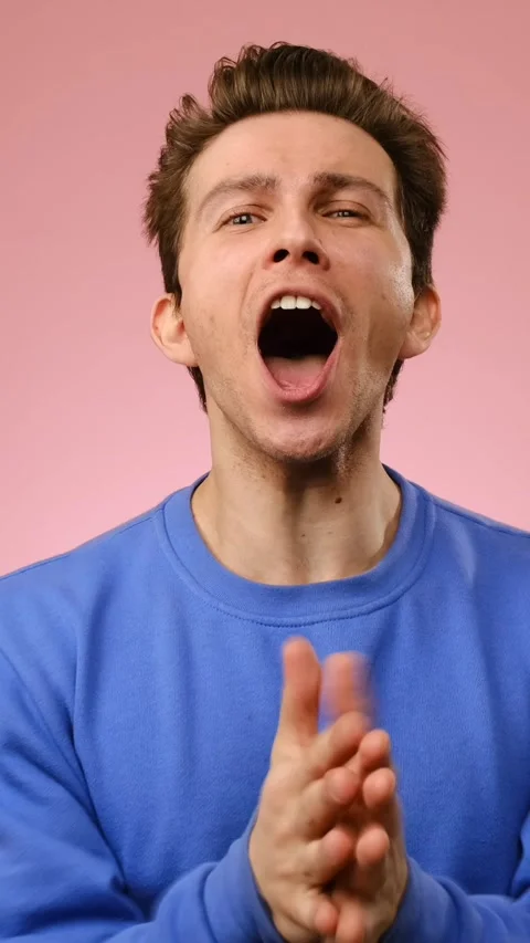 Excited Young Man Clapping Hands and Applauding Stock Footage 328127627