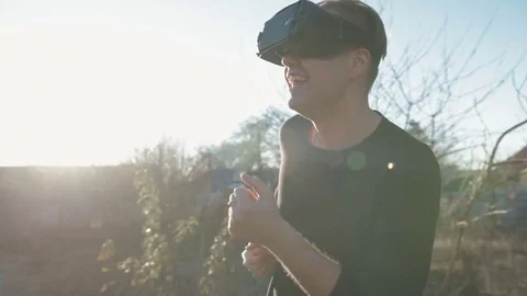 Excited young man with virtual reality headset dancing. Stock Footage 84846392