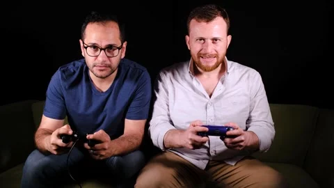 Excitedly playing games Stock Footage 255455468