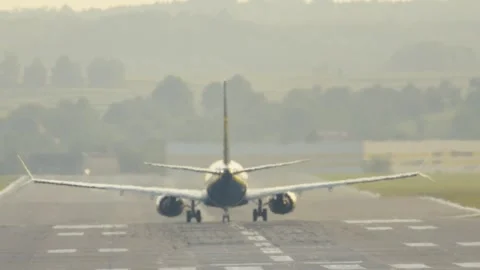Excitement builds during a vibrant plane take off into the clear sky Video stock 311639142