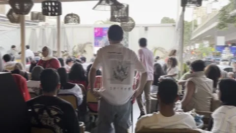 Excitement in Cairo during the Round of 16 match between Argentina and Egypt, El Video stock 338413290