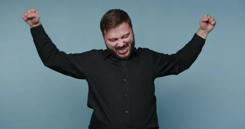 Excitement explodes in rhythm as joy takes center stage in a playful dance .. Vídeos de archivo 329111190