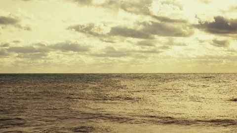 The excitement of the ocean with the sun and clouds Stock Footage 81402502