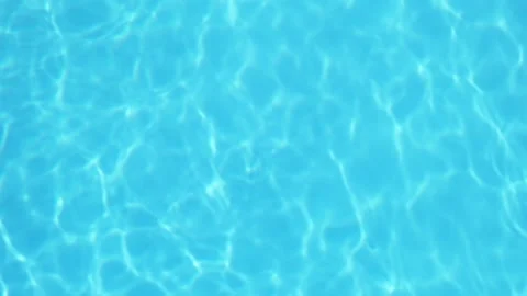 Excitement on the surface of the pool water, top view Video stock 330429492
