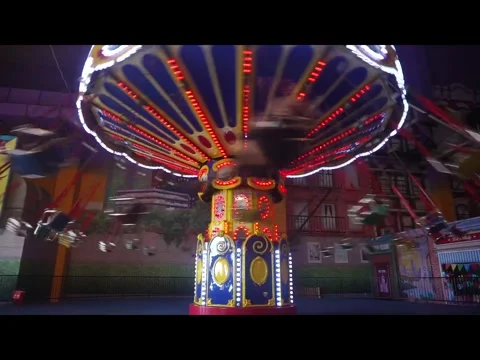 The excitement of two children playing the Paris Swing game at Transmart Padang Stock Footage 293994874
