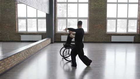 Exciting dancing couple training in dance hall Stock Footage 157920141