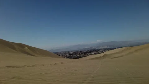 Exciting dune buggy ride across high desert slopes Huacachina Peru Video stock 348786331