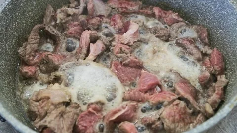 Exciting footage of beef being cooked in a pan, ready to be served Stock Footage 279913047