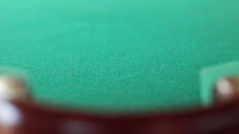 An exciting moment when the billiard balls roll into the pocket after a precise Stock Footage 276755898