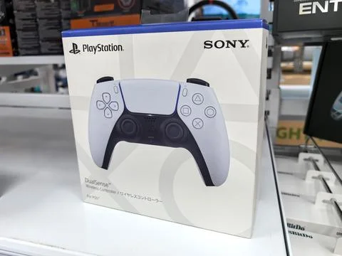Exciting new gaming controller showcased in vibrant retail display Stock Photos