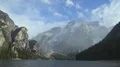 Exciting panorama of beautiful Dolomites, view on trees and lake Prags, travel 4k or 4k+ Resolution