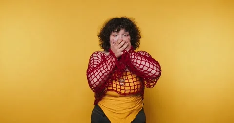 Exciting performance featuring a person expressing surprise with a colorful.. Stock Footage 313273741