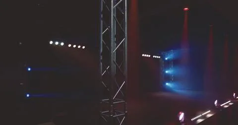 Exciting stage setup with dramatic lighting in a performance venue Stock Illustration