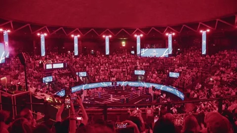 Exciting thai boxing match in a large arena in Bangkok, Thailand. Crowd cheering Stock Footage 335326682