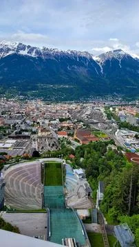 An exciting top view from the Bergisel ski jump stadium to the Innsbruck. In the Stock Photos