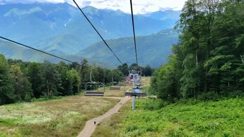 Exciting view on caucasian mountain range from cable car moving down. Stock Footage 282112742
