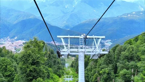 Exciting view on caucasian mountain range from cable car moving down. Stock Footage 282471515