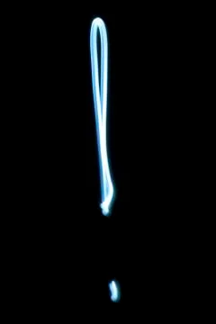 Exclamation mark from neon light. Stock Photos
