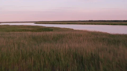 Exclusive 8K version.  Aerial view of wetlands along the New Jersey shore.  Shot Stock Footage 130397967