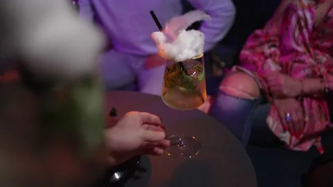 Exclusive and creative serving of alcoholic beverages in a luxurious restaurant. Stock Footage 233277211
