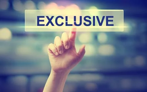 Exclusive concept with hand pressing a button Foto stock