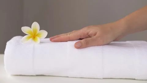 Exclusive Spa Arrangement Featuring Pristine Fabrics And Fragrant Floral Accents Stock Footage 329276909