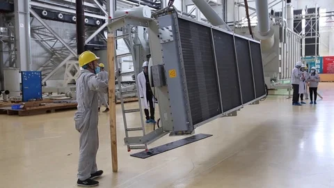An excursion 2018/03/04, people in the factory workshop,which make transformers Stock Footage 89297507