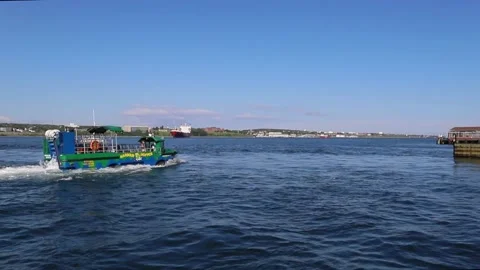An excursion amphibious bus with tourists sails across the ocean. Attraction. Stock Footage 239020340