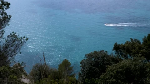 Excursion boat from above the cliffs of Cinque Terre Stock Footage 252269131
