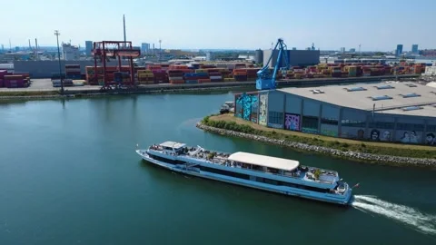 Excursion boat with passengers passing through the harbour of Linz, Austria Video stock 342403936