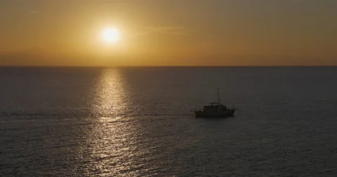 Excursion boat sails at sunset Stock Footage 221980460