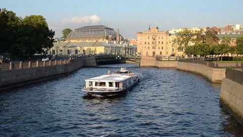 Excursion boats float on the Moika River in Saint-Petersburg. Russia Stock Footage 75419350