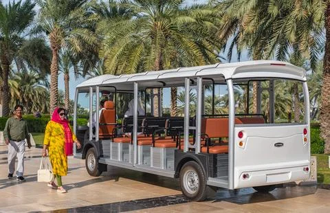 Excursion bus. A small open bus for transporting tourists in Abu Dhabi UAE. Stock Photos