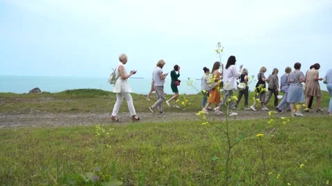 Excursion group on the beach Stock Footage 197155405