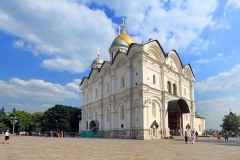 Excursion group of foreign tourists on the background of the Archangel Cathed Stock Photos