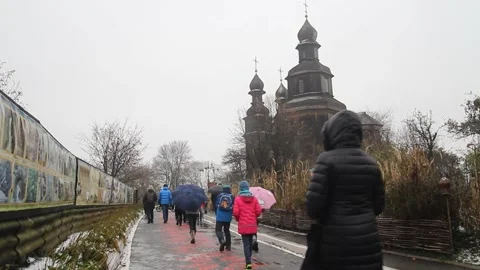 Excursion of a group of people to the ancient temple of the church Stock Footage 158451355