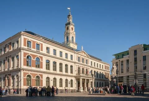 Excursion groups near the town hall in Riga Stock Photos